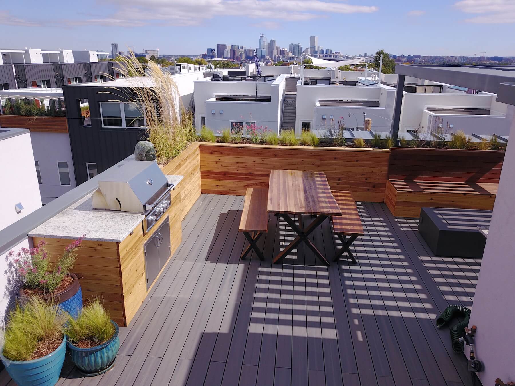 Roof Deck With Built-In Grill & Outdoor Dining Roof Deck Planters Outdoor furniture Pergola Sloans Lake Denver CO Roof Deck and Garden