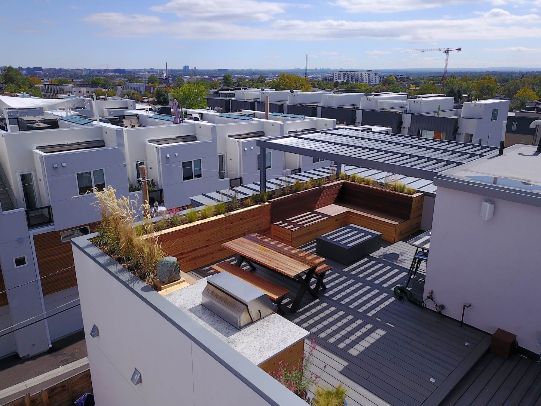 Roof Deck With Outdoor Dining Roof Deck Planters Outdoor furniture Pergola Sloans Lake Denver CO Roof Deck and Garden