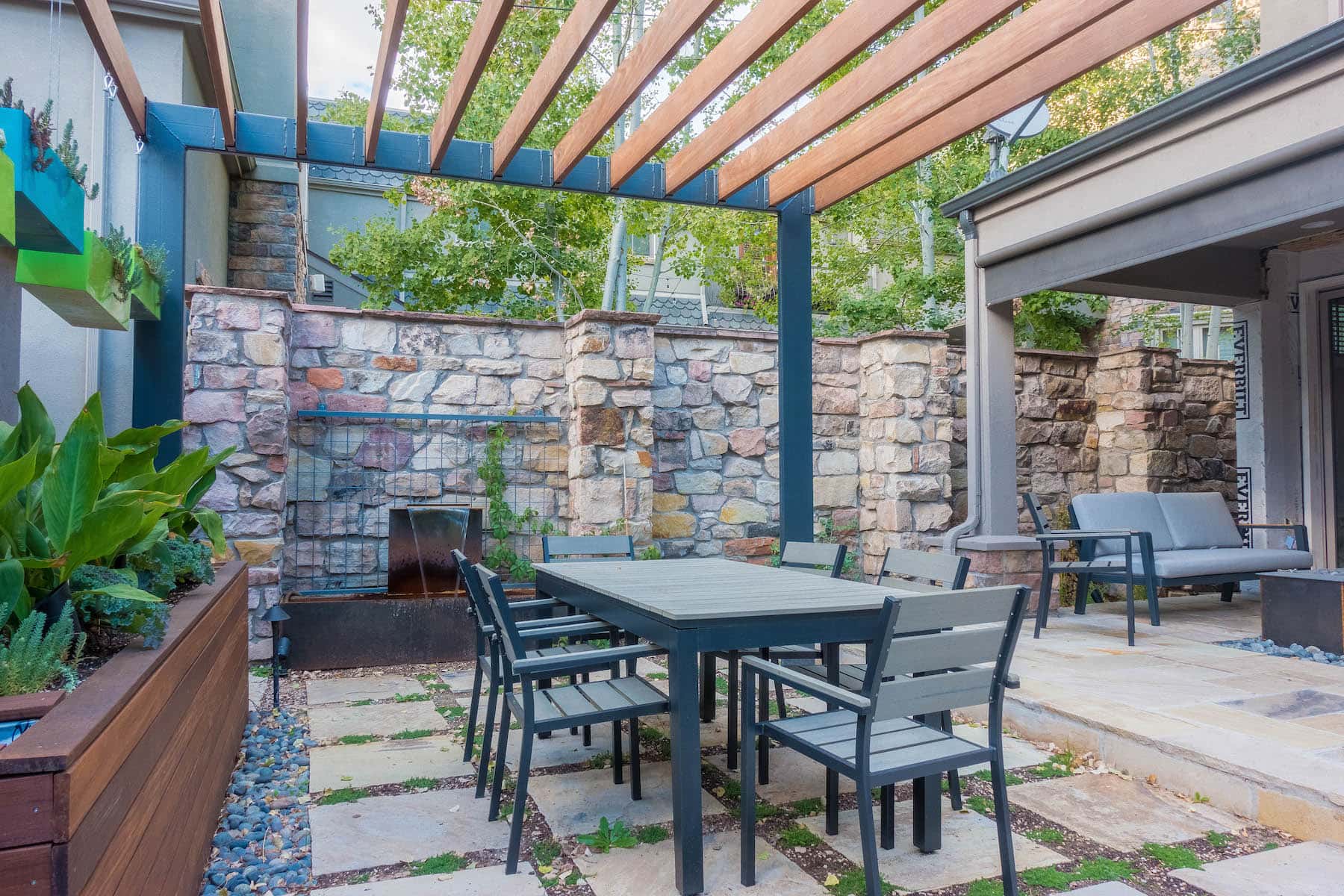 Pergola dining outdoor furniture Denver Roof Deck Garden Landscape Pergola Outdoor Dining Water Feature Patio Rooftop Deck LoHi Denver CO