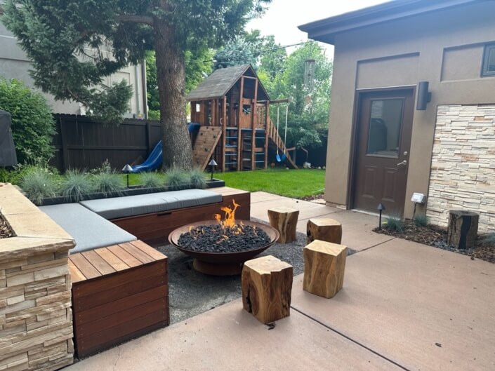 Patio and fire pit in backyard washington park denver co