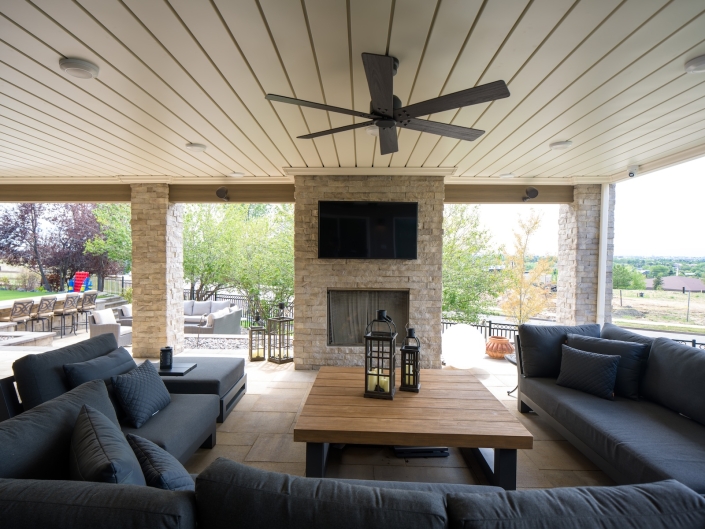 outdoor fireplace and tv in centennial, co